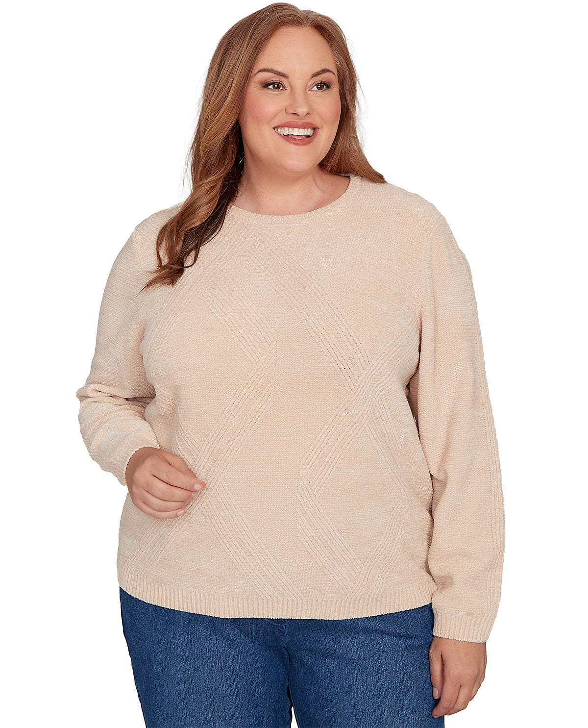 Woman wearing a beige sweater and blue jeans on a white background