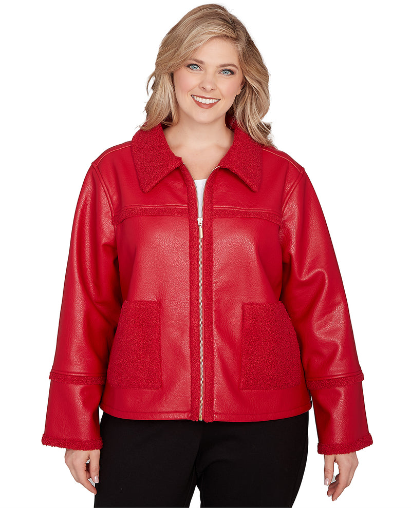 Woman wearing a red leather jacket on a white background