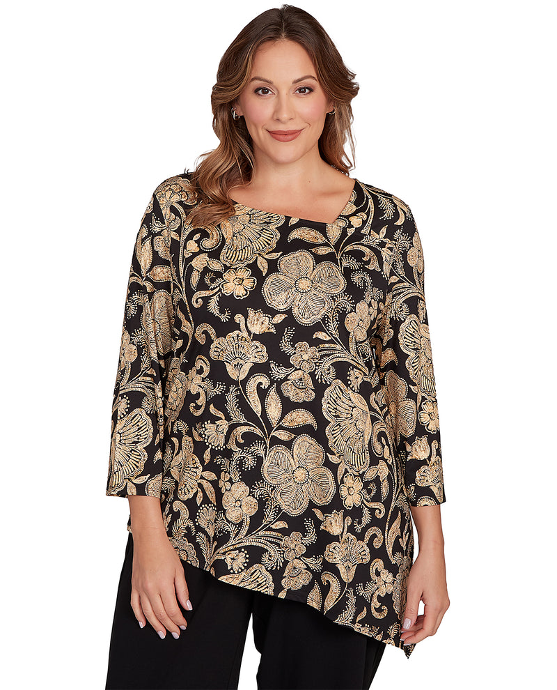 Woman wearing a floral patterned blouse on a white background