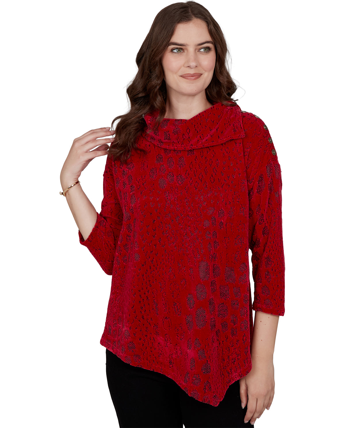 A woman modeling a red textured knit top with a high ruffled collar and three-quarter sleeves, paired with black pants, against a plain white background.