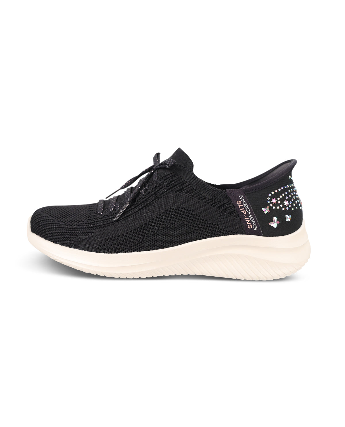 A black knit slip-on sneaker with a thick, textured off-white sole and small butterfly embellishments on the heel, shown from a side profile on a white background.