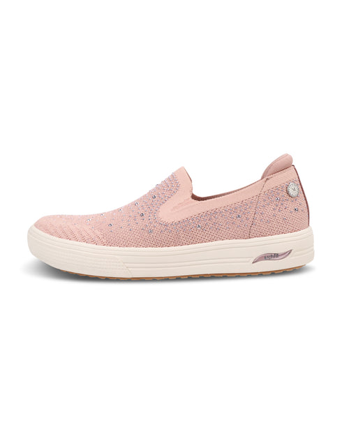 A single slip-on sneaker in light pink with a textured knit upper, a small rhinestone detail on the side, and a thick white platform sole, shown against a plain white background.
