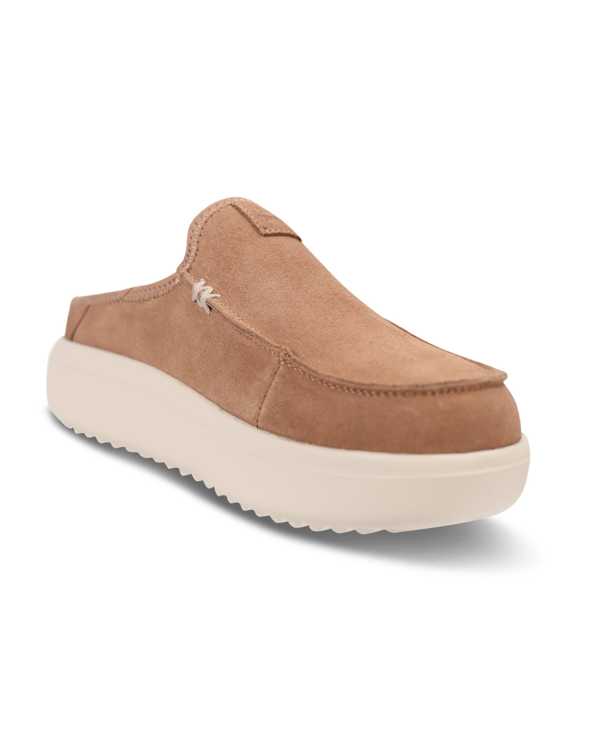 A tan suede slip-on clog shoe with a thick, off-white platform sole, shown from a three-quarters angle on a white background.