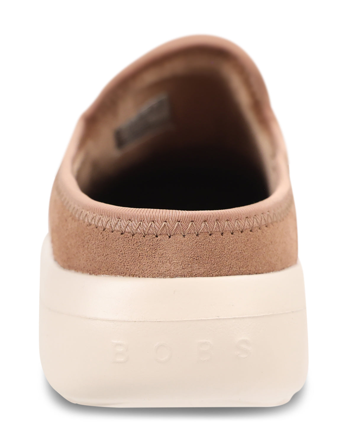 A single slip-on clog shoe in tan suede with a thick cream-colored sole, shown from a side profile view against a plain white background.