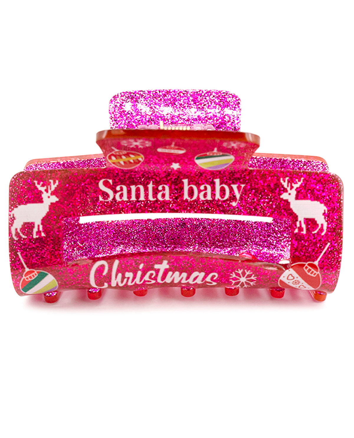 A pink glitter hair claw clip with 'Santa baby Christmas' text and holiday illustrations, shown on a white background.