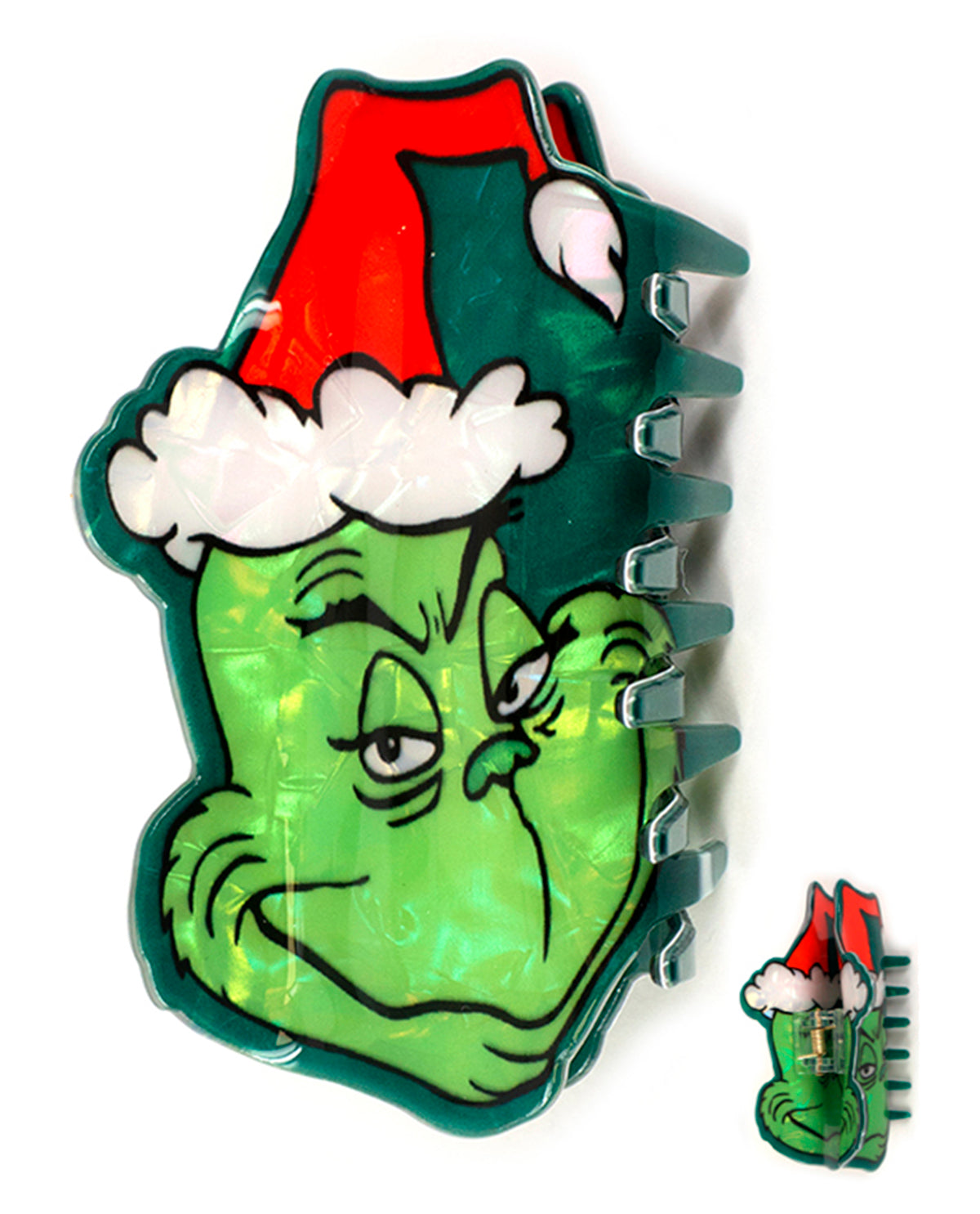 A Grinch-themed hair claw clip featuring a green Grinch face wearing a red Santa hat with white trim, shown on a plain white background with a smaller inset of the clip from the back.