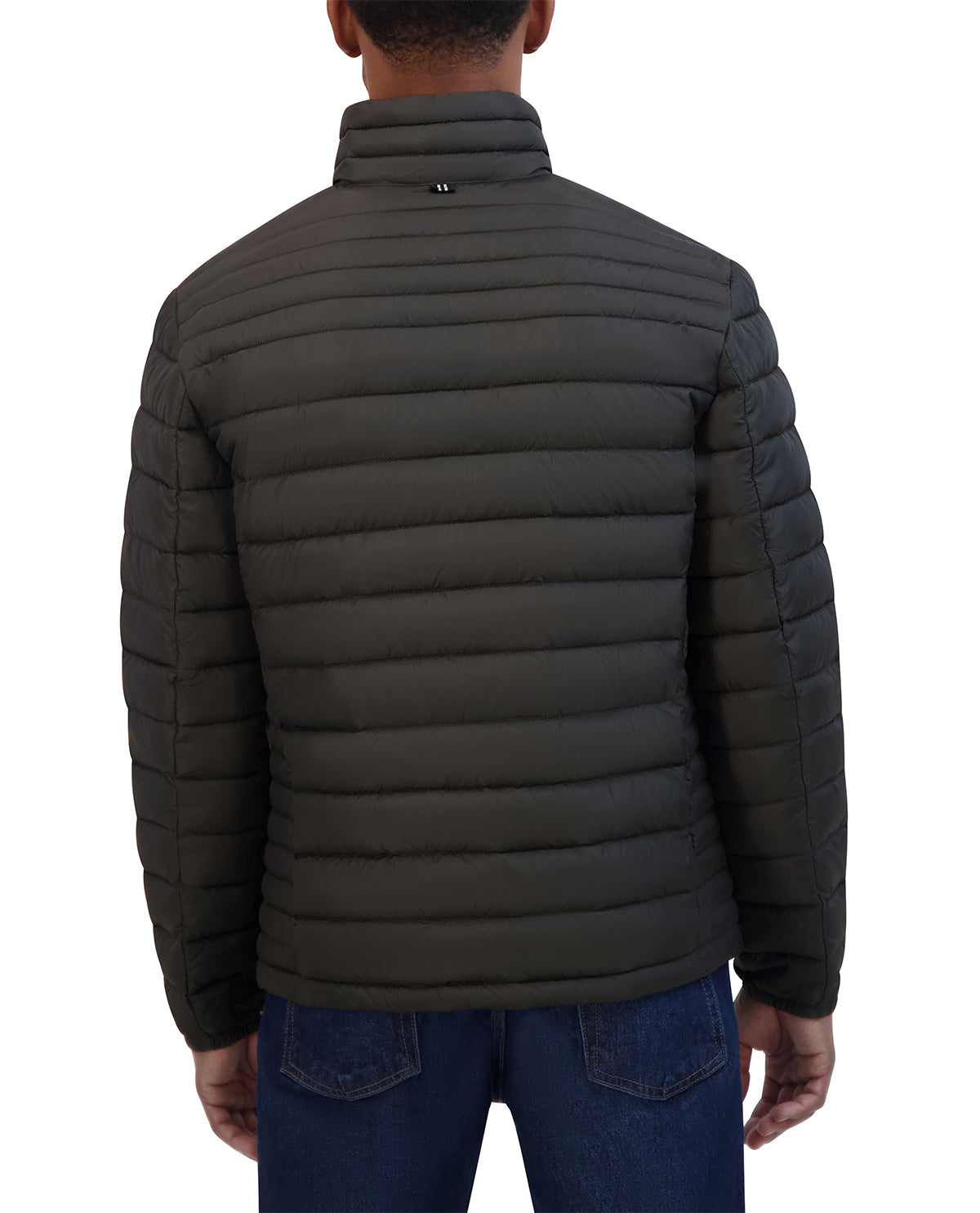 Person wearing a dark green puffer jacket on a white background