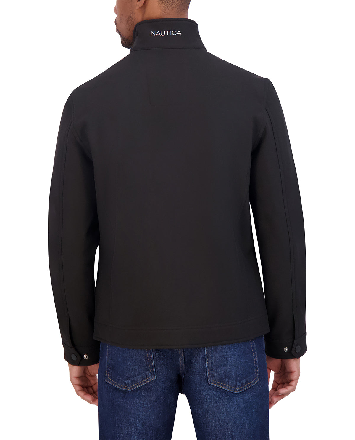 Person wearing a black Nautica jacket on a white background