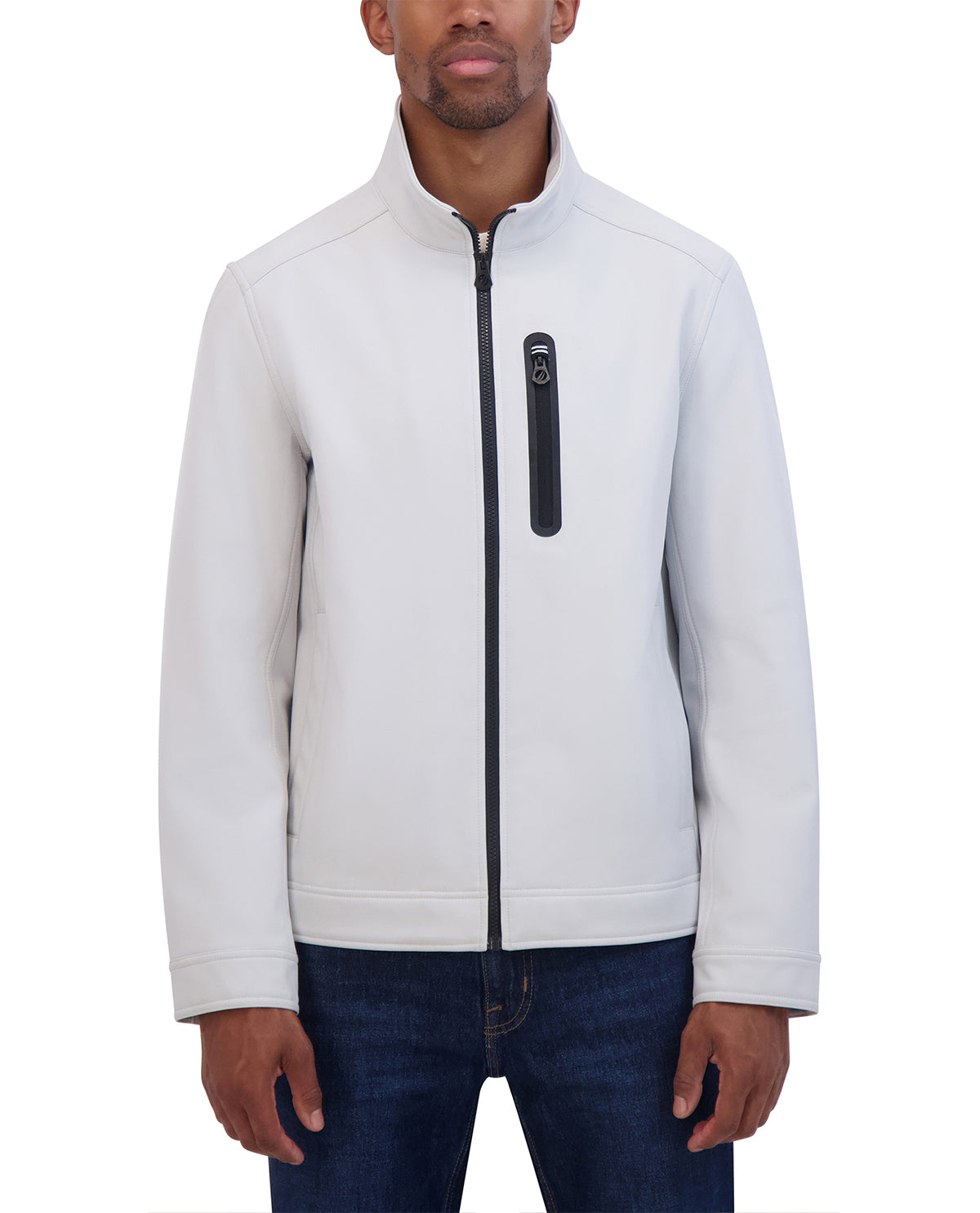 Man wearing a light gray jacket with a black zipper on a white background