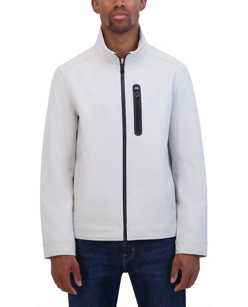 Man wearing a light gray jacket with a black zipper on a white background