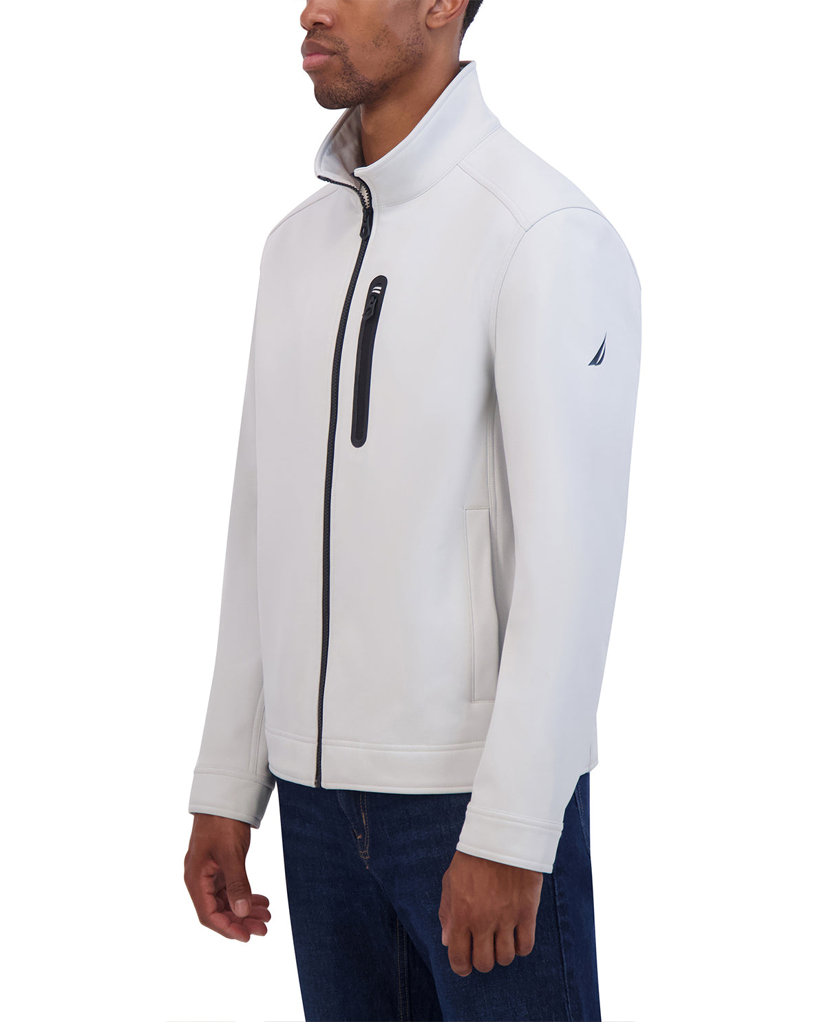 Man wearing a white jacket with a brand logo on a white background