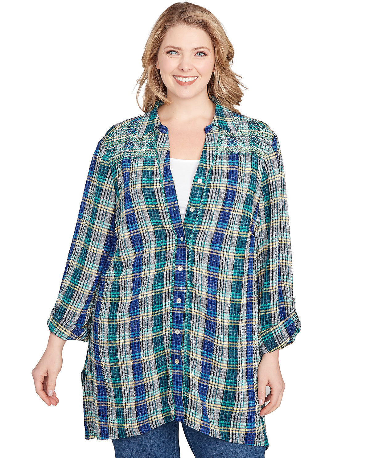 Woman wearing a plaid shirt on a white background