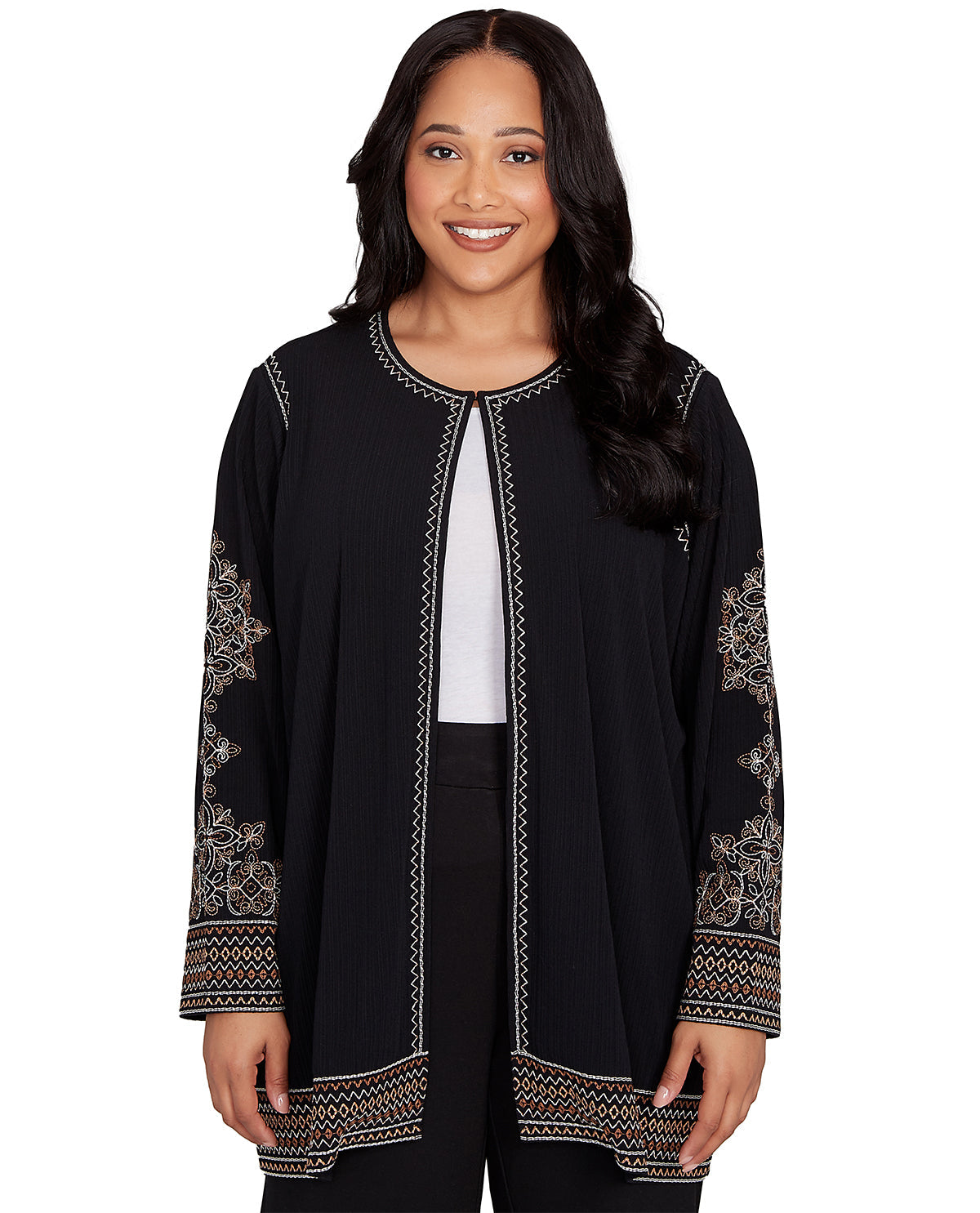 Woman wearing a black embroidered jacket on a white background