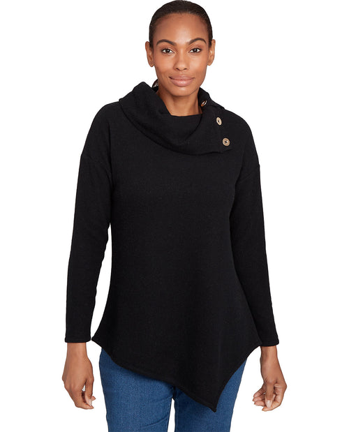 Woman wearing a black cowl-neck sweater with button details on a white background