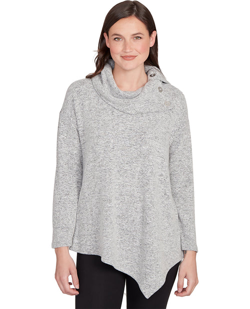 Woman wearing a gray sweater on a white background