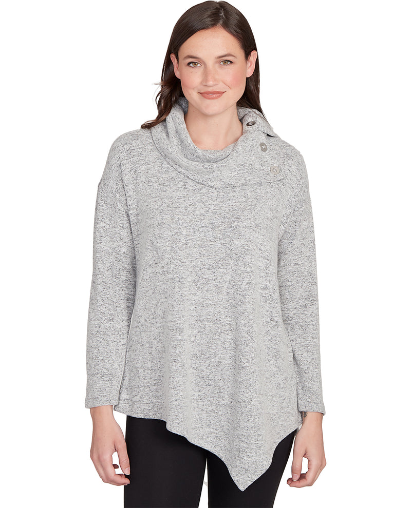 Woman wearing a gray sweater on a white background