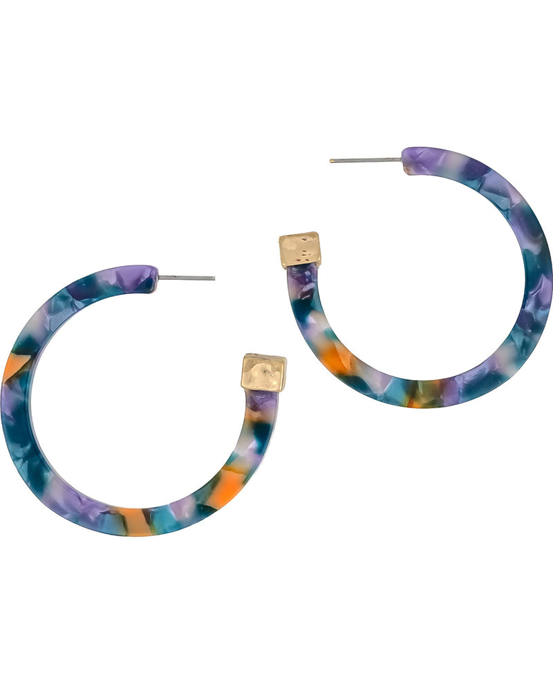 Marbled hoop earrings with a mix of purple, teal, orange, and blue colors, featuring gold square studs and silver posts on a white background.