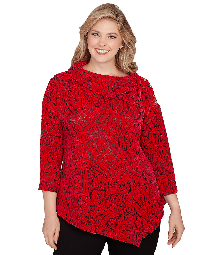 Woman wearing a red lace top on a white background