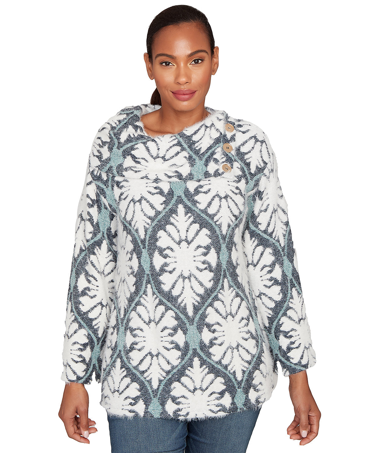 Woman wearing a patterned sweater on a white background