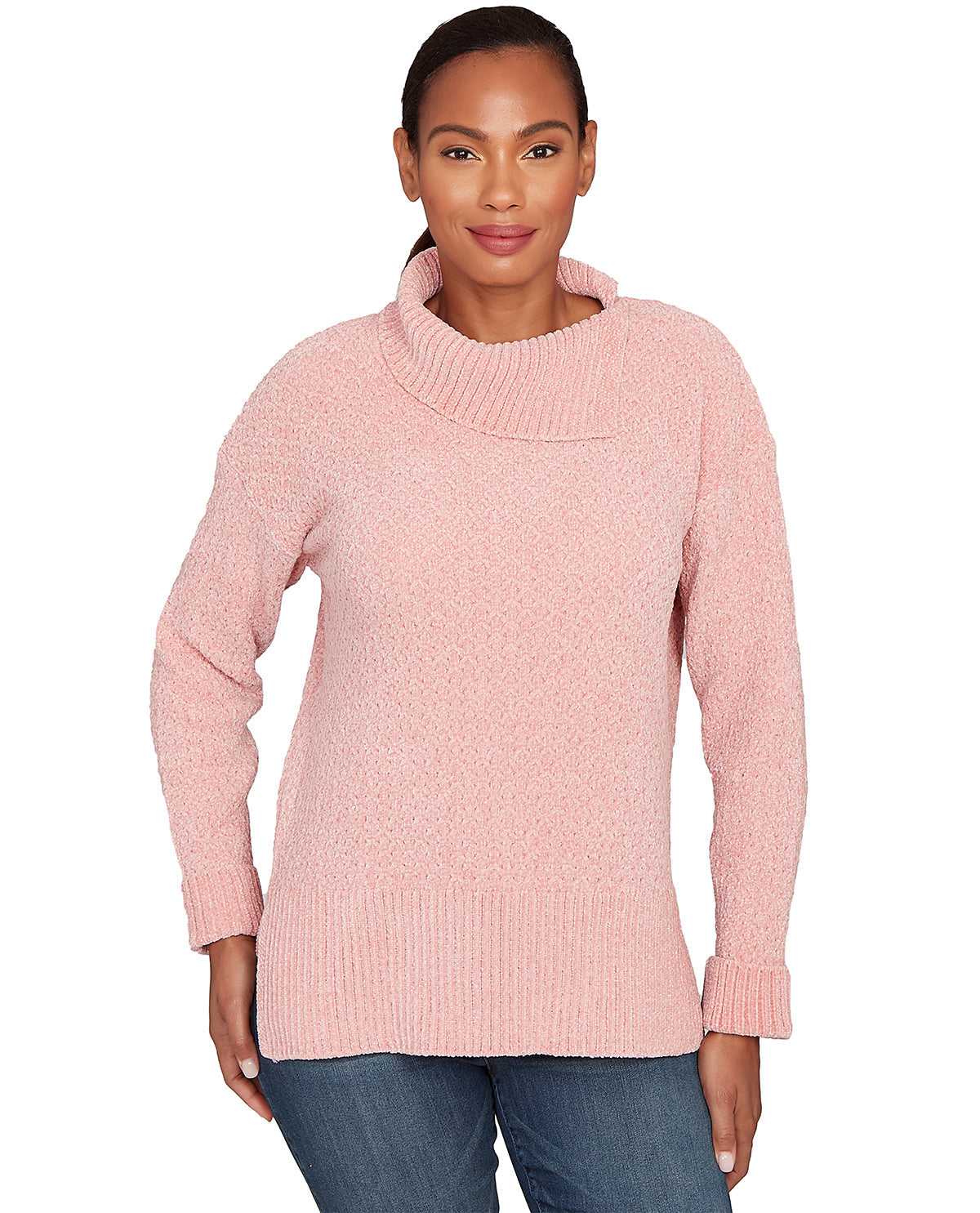 Woman wearing a pink sweater on a white background
