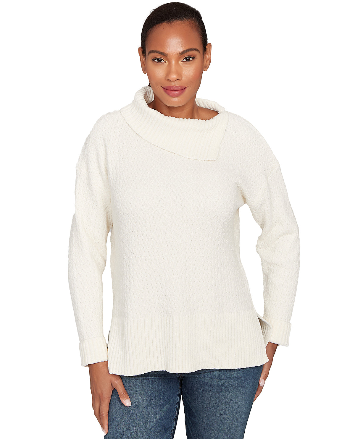 Woman wearing a cream-colored sweater on a white background
