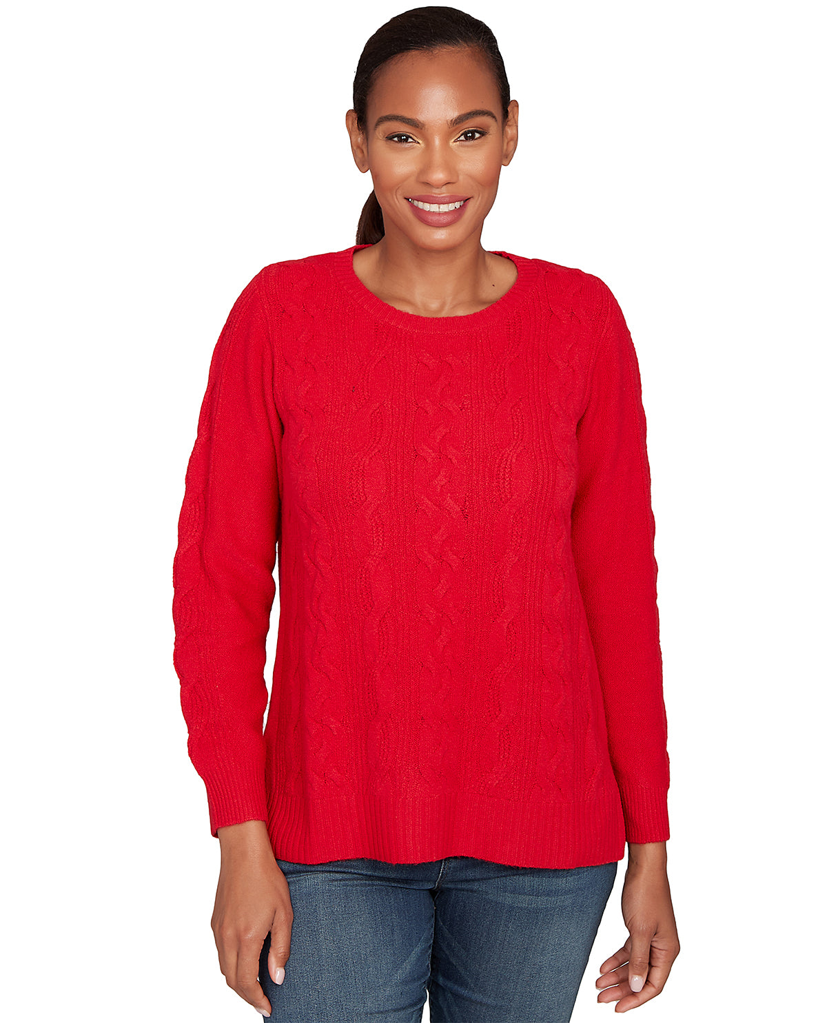 Woman wearing a red cable knit sweater on a white background