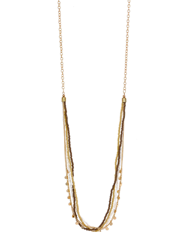 Gold necklace with multiple strands on a white background
