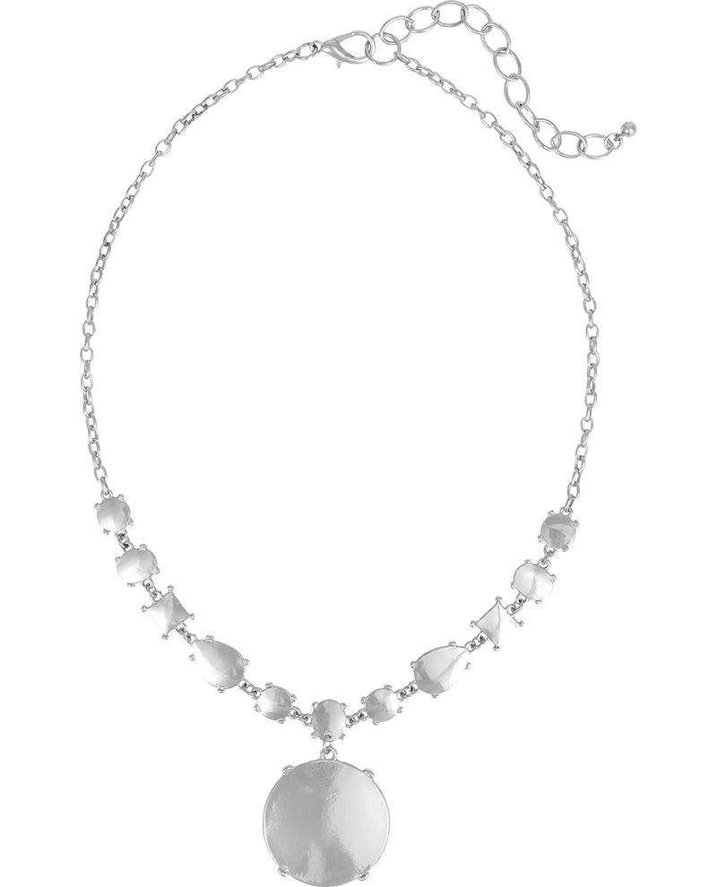 A silver-toned statement necklace featuring a delicate chain, a row of small teardrop-shaped clear stones, and a large oval pendant at the center, shown against a plain white background.