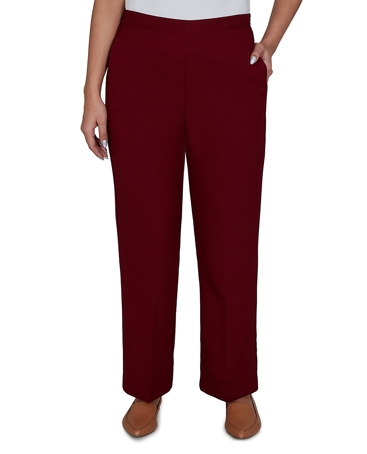 Maroon pants worn by a person on a white background
