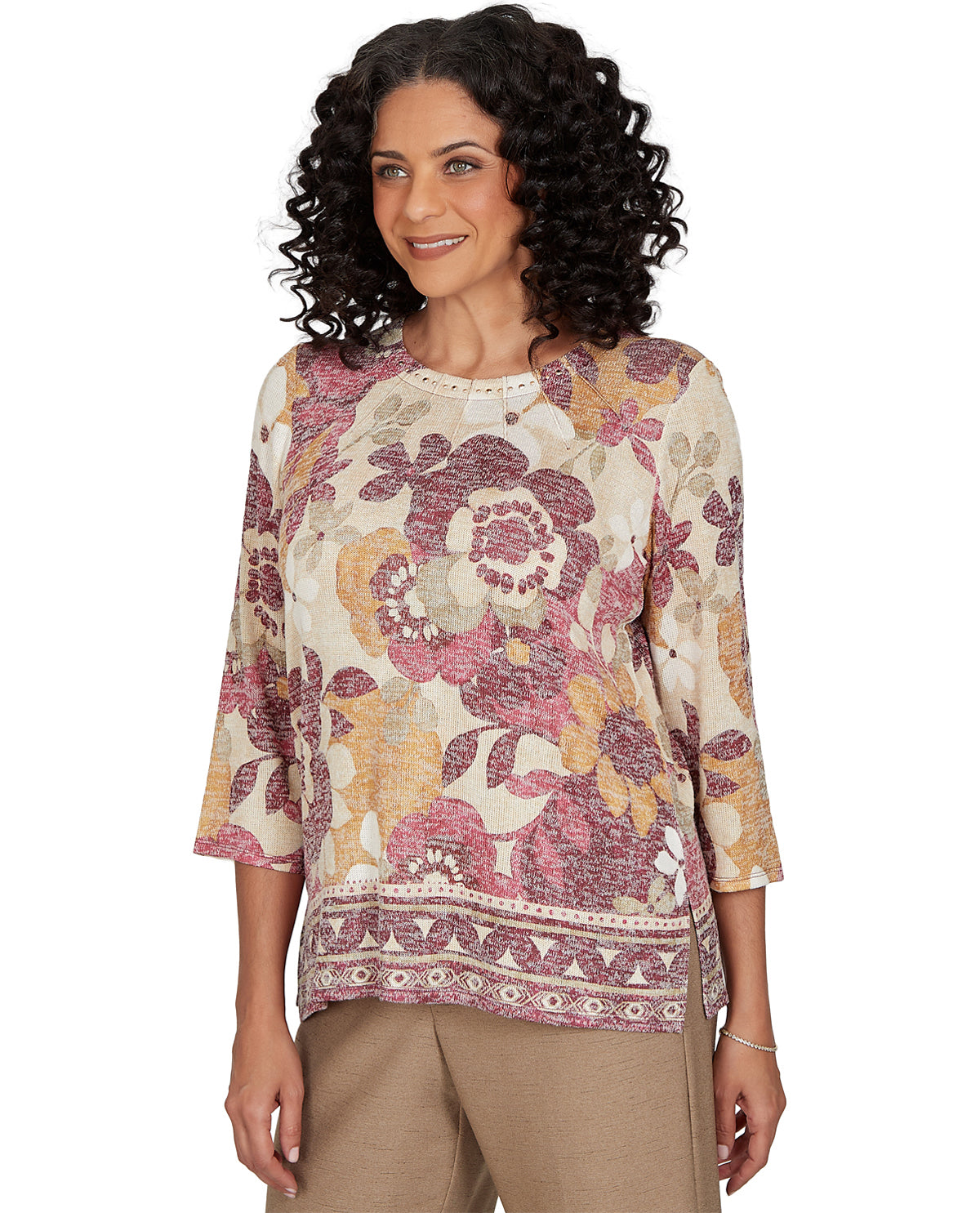 Woman wearing a floral blouse with a white background
