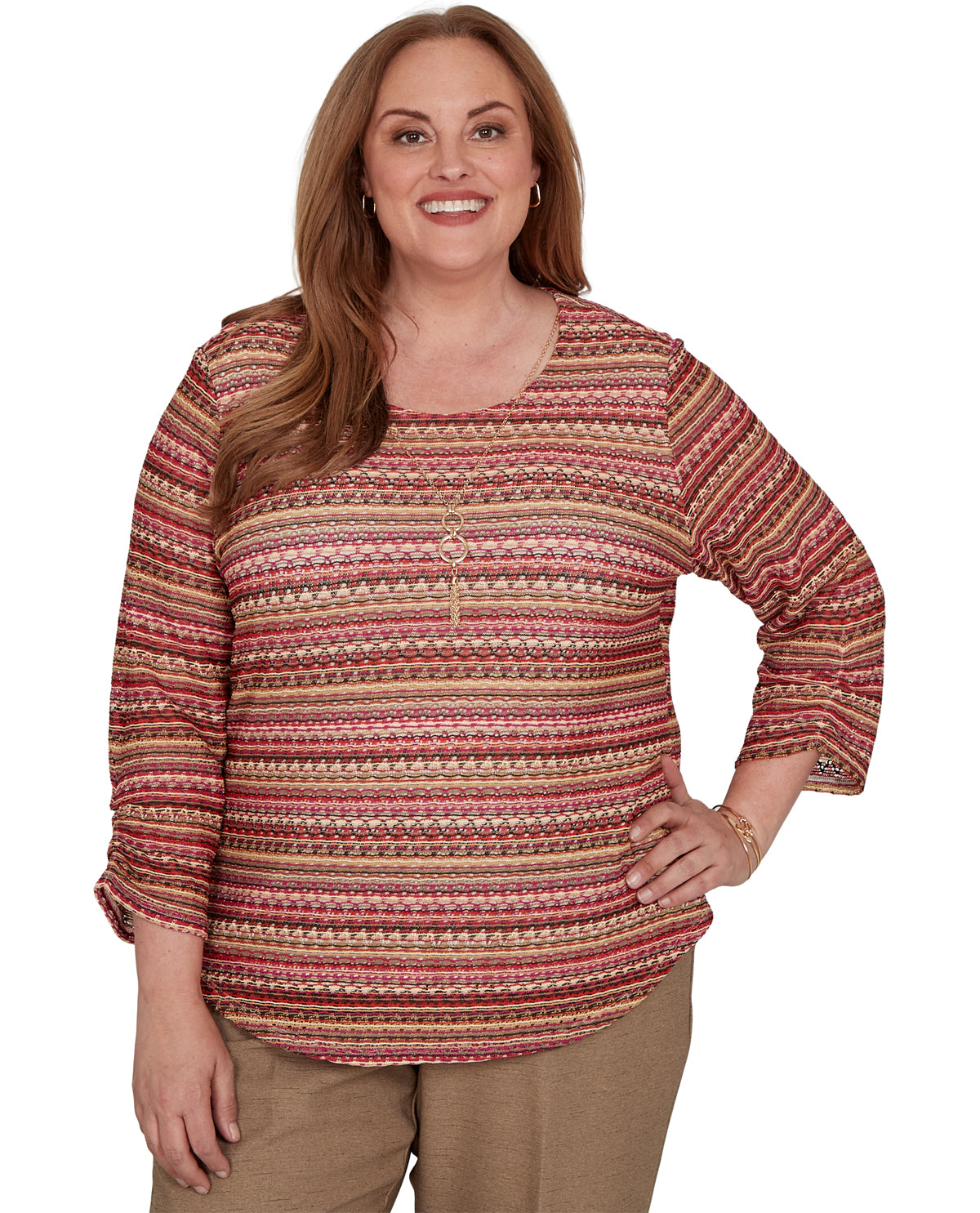 Woman wearing a patterned sweater on a white background