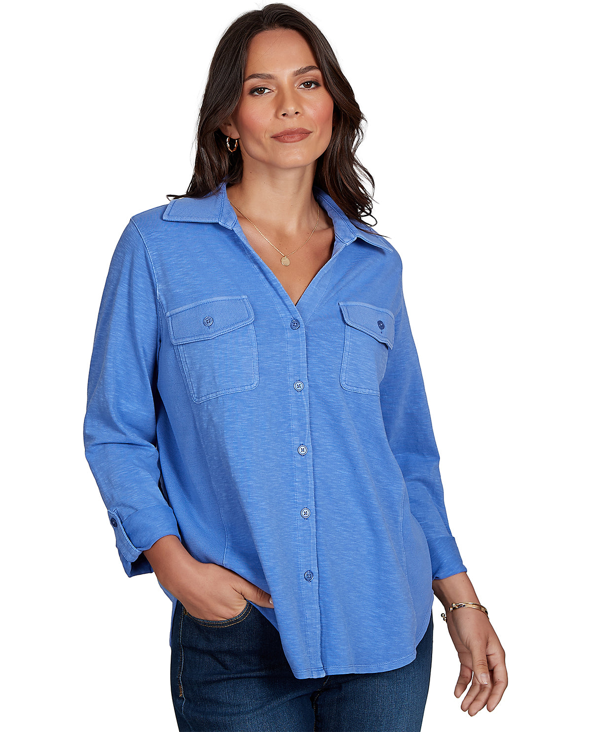 Woman wearing a blue button-up shirt on a white background