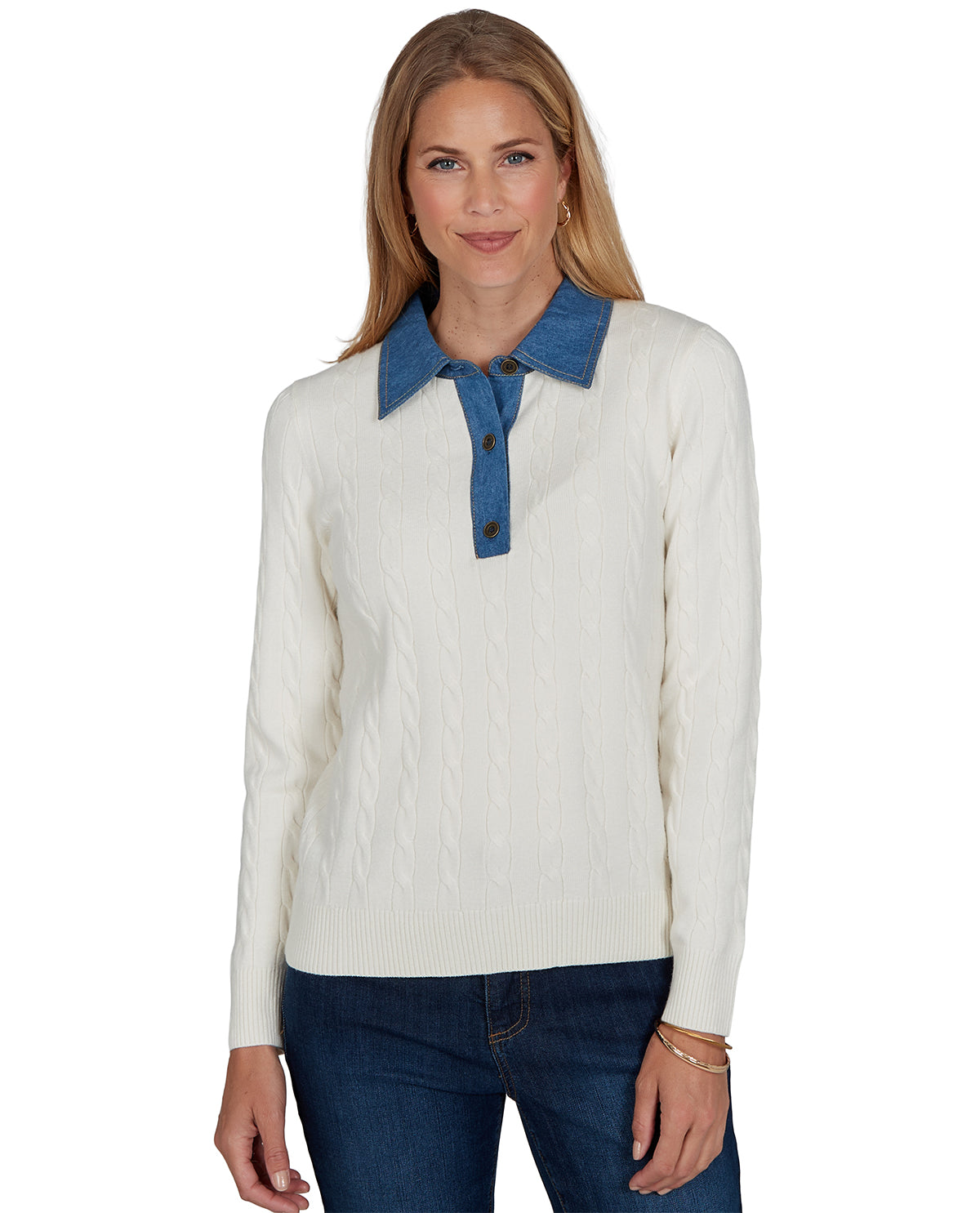 Woman wearing a white sweater with a blue collar on a white background