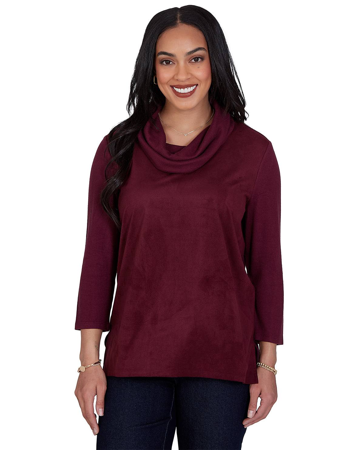 Woman wearing a burgundy cowl-neck sweater on a white background