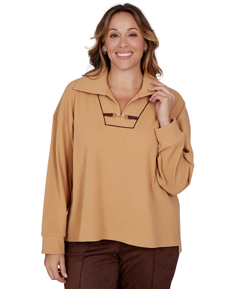 Woman wearing a beige blouse with a white background