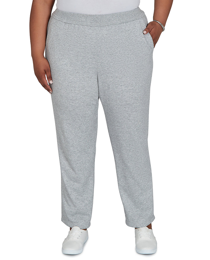 Plus size model wearing short gray trouser pants
