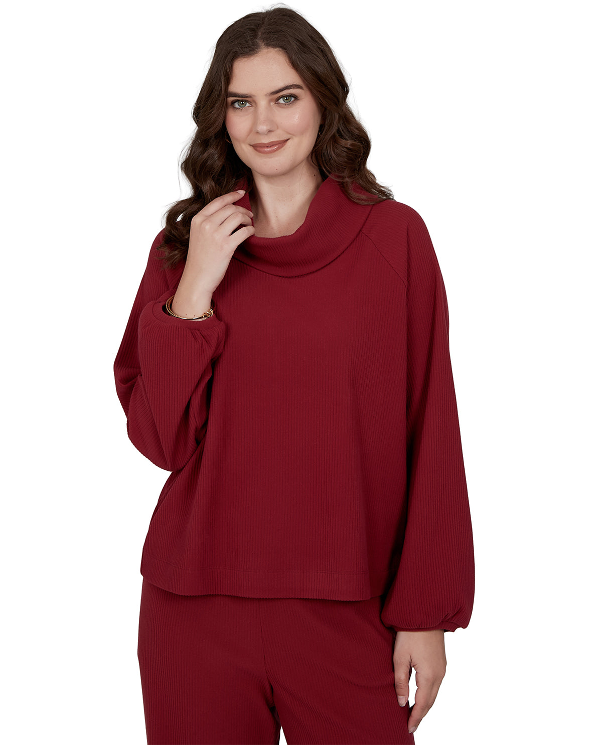 Woman wearing a red outfit on a white background