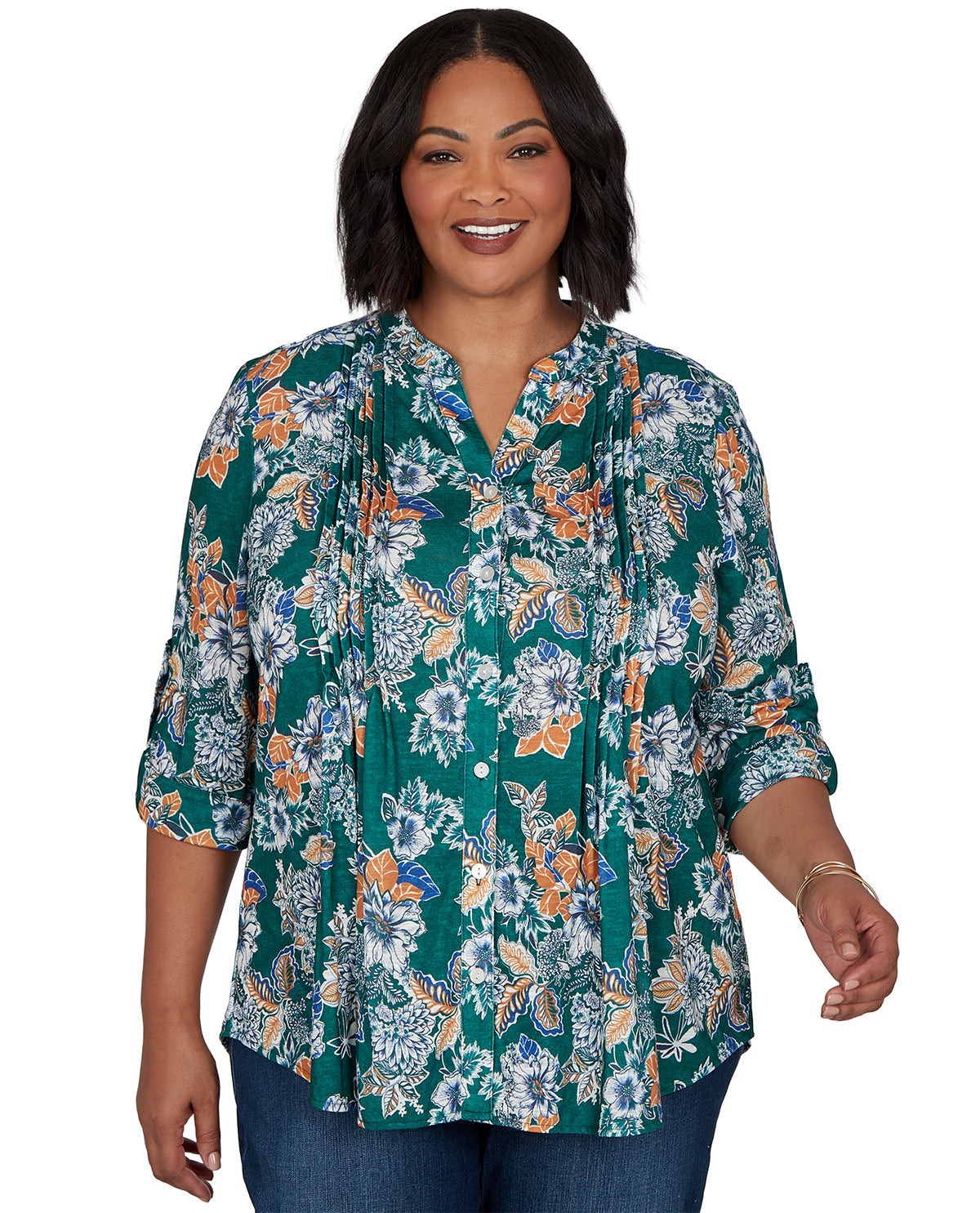 Woman wearing a floral blouse with a white background