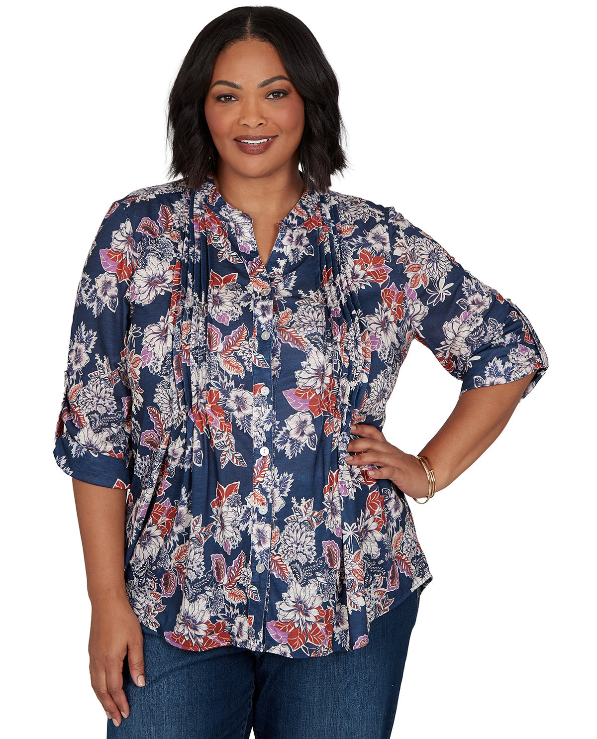Woman wearing a floral blouse with a white background