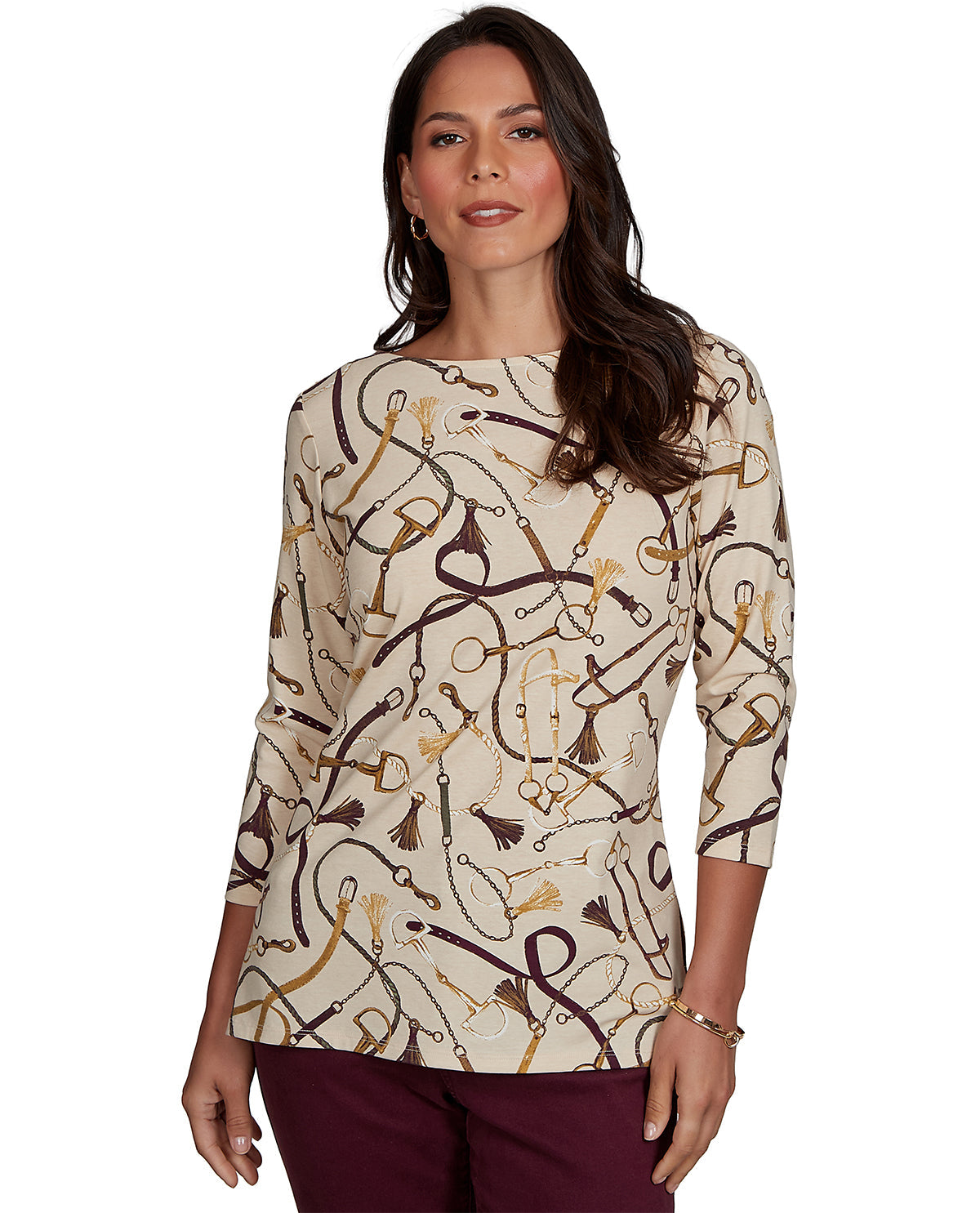 Woman wearing a patterned top with a white background
