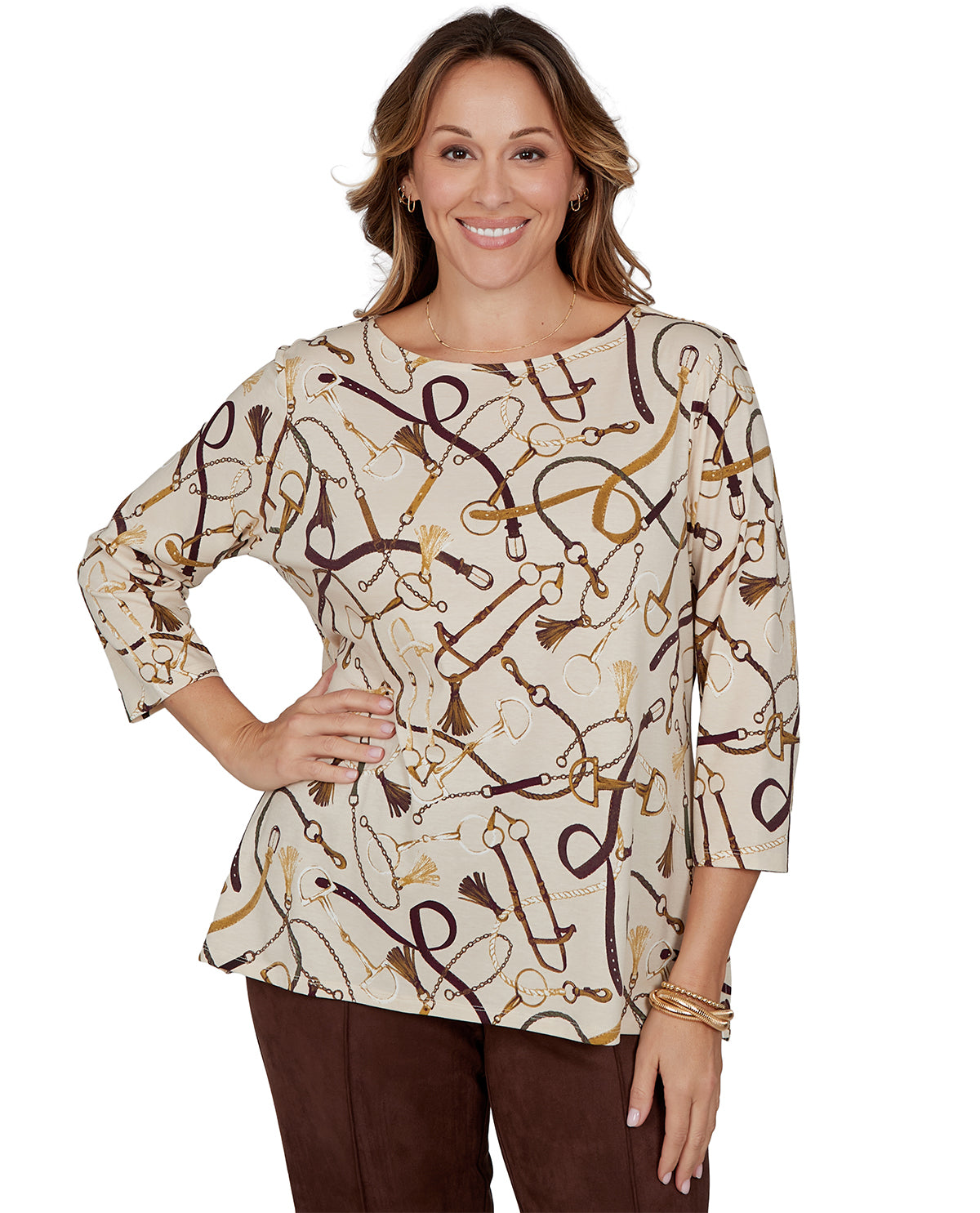 Woman wearing a patterned blouse with keys on a white background