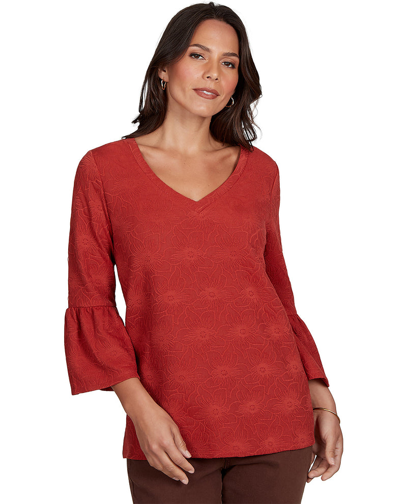 Woman model wearing a petite 3/4 sleeve floral red top