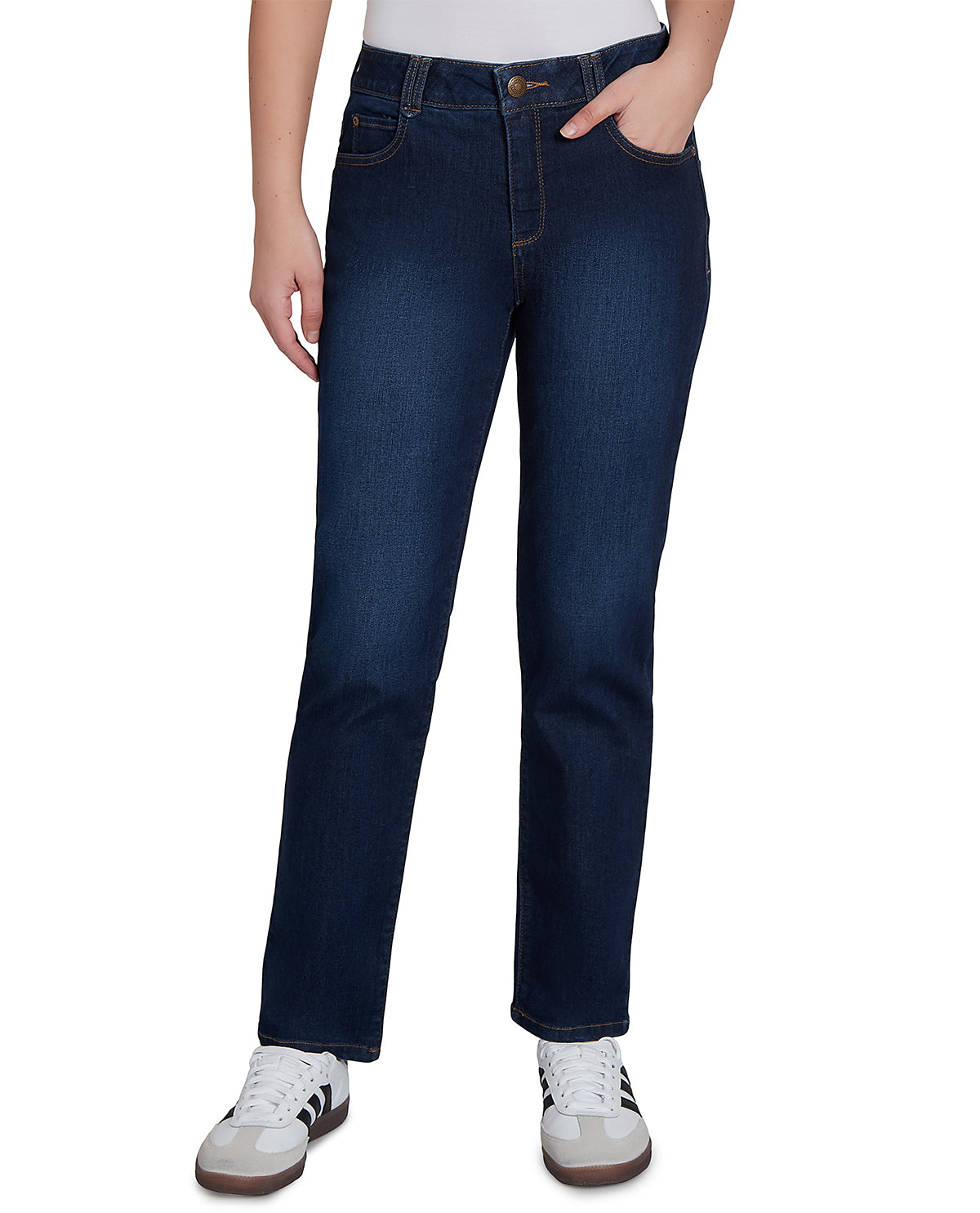 Person wearing dark blue jeans on a white background