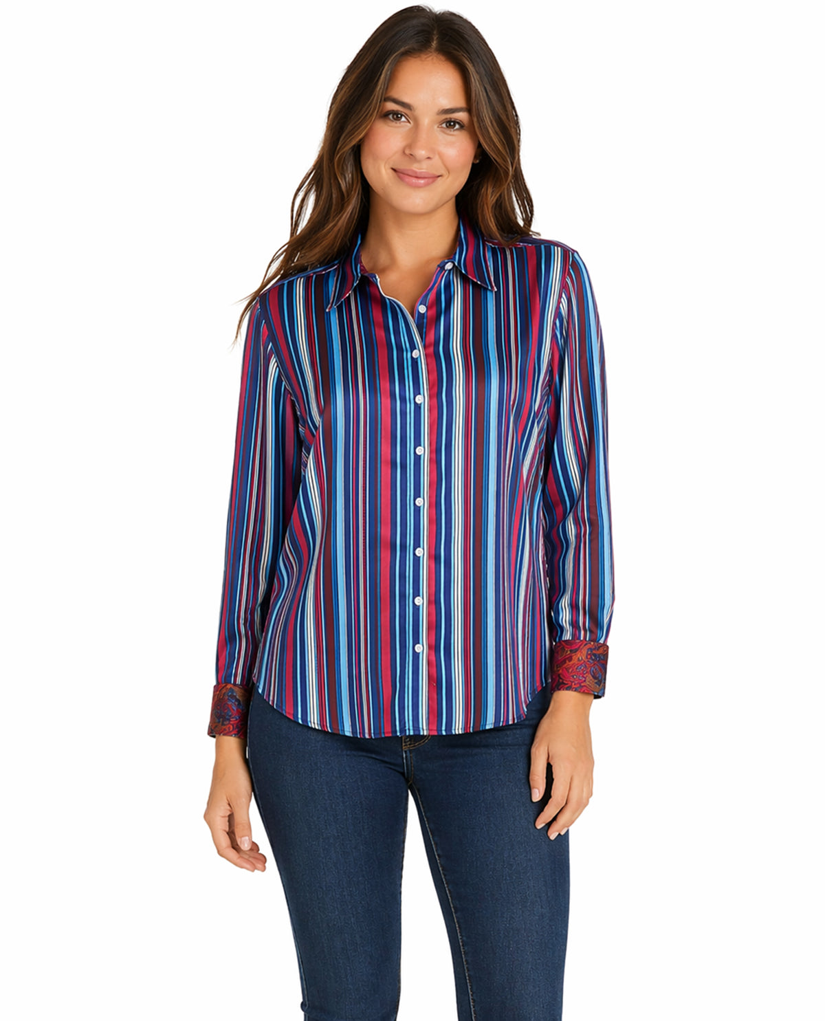 Woman wearing a colorful striped shirt and jeans on a white background