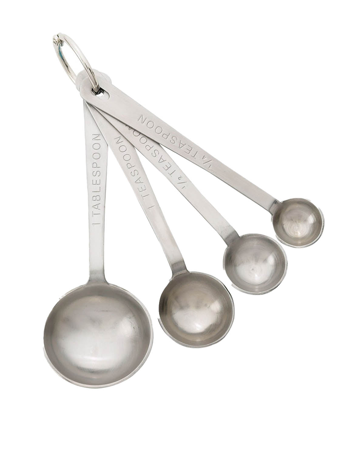 Set of four metal measuring spoons with engraved measurements on a white background