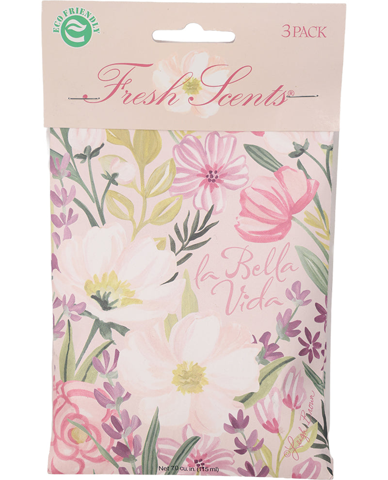A 3-pack of Fresh Scents by La Bella Vita 'la Bella Vida' scented paper towels. The product is packaged in a clear plastic bag with a light pink header card and features a floral pattern of pink, purple, and green flowers on a pale pink background.