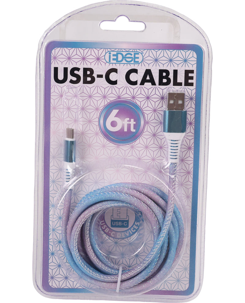 A 6-foot USB-C cable by i-EDGE, packaged in a clear plastic blister pack with a decorative purple and blue backing card. The cable features a braided pastel pattern of light blue, lavender, and purple.