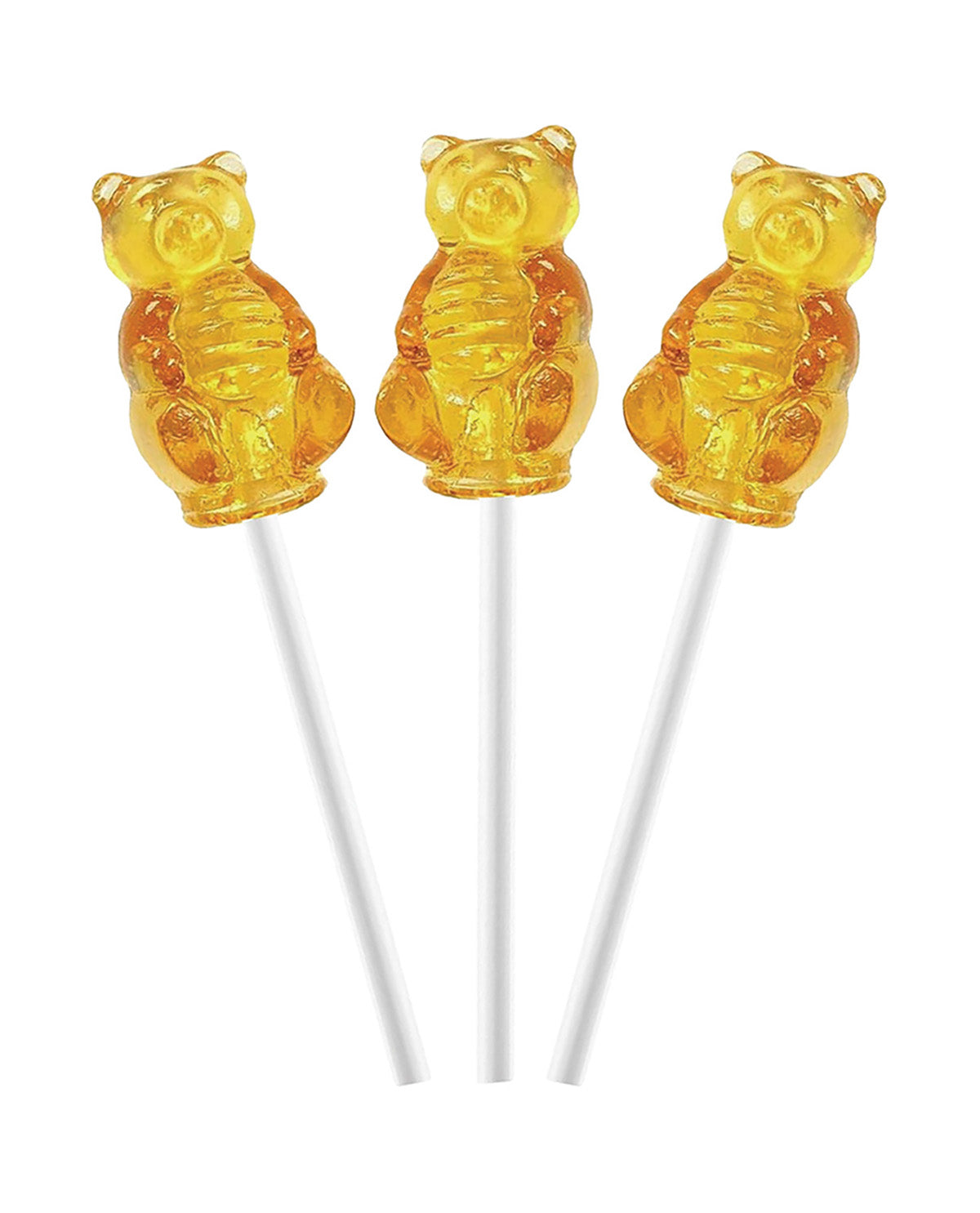 Three yellow bear-shaped lollipops on white sticks against a white background