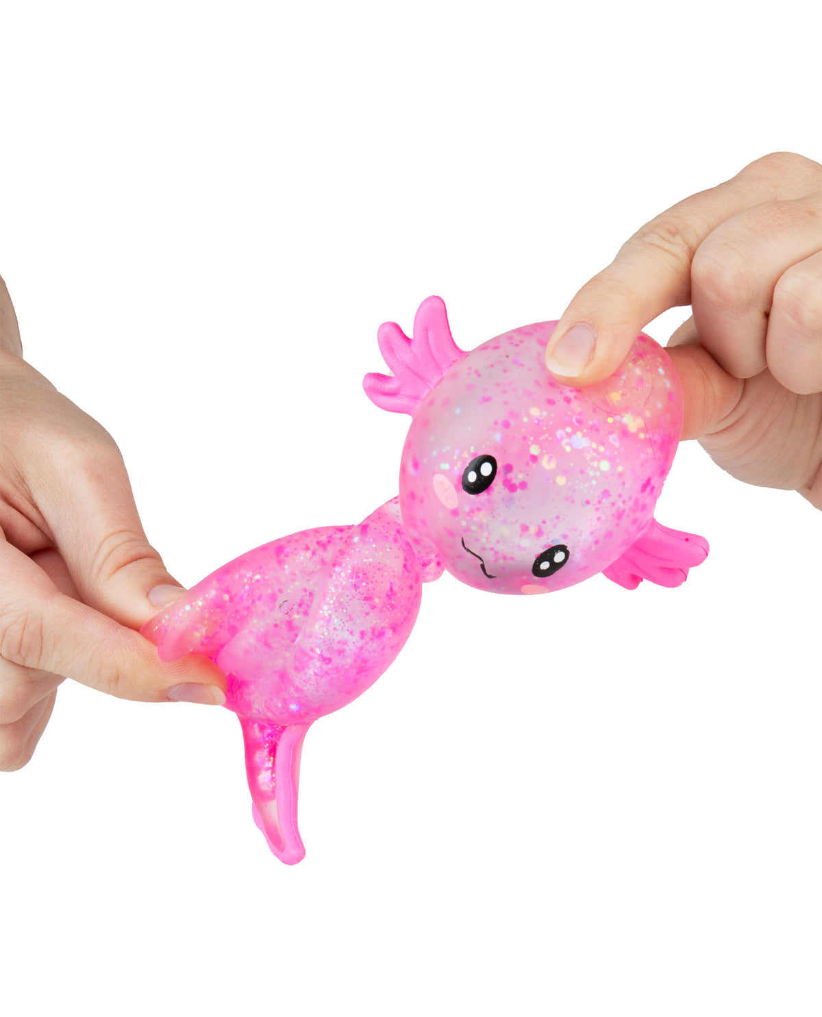 Pink axolotl toy with glittery texture held by two hands on a white background
