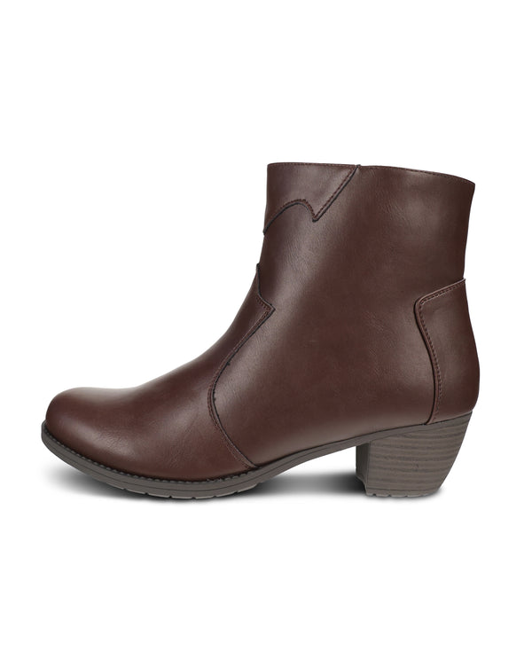 Brown Chelsea boot on a white background